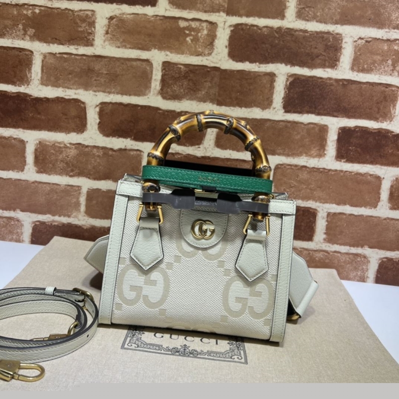 G*u*i top handle bags